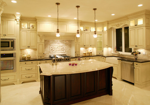 Light colored reflective surfaces enhance the ambient light in this kitchen